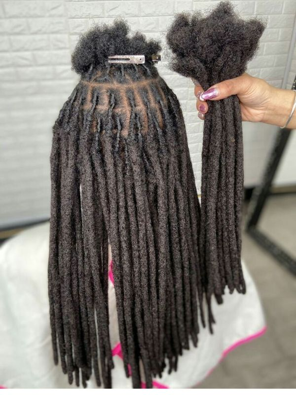 Heavy-locs-extension-causing-thinning-locs 