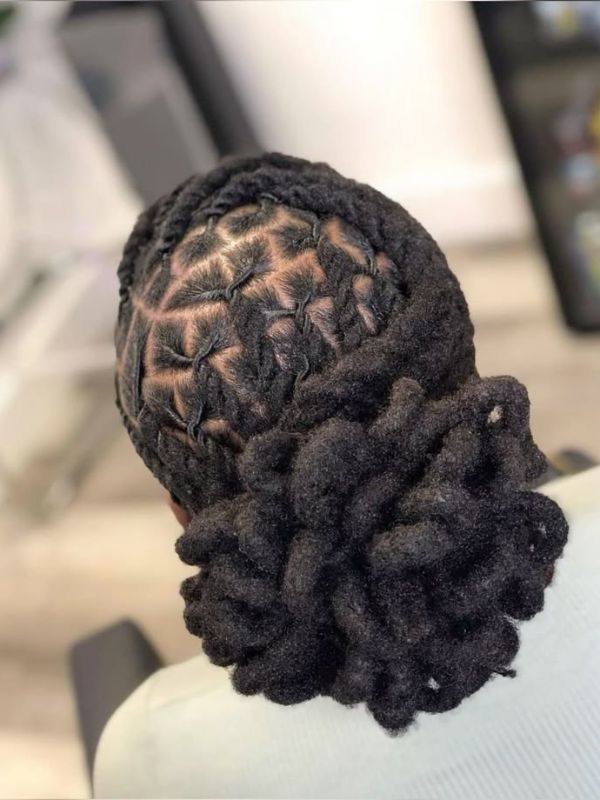 Long-Barrel-Twist-Locs-With-a-Sculpted-Bun-for-Women