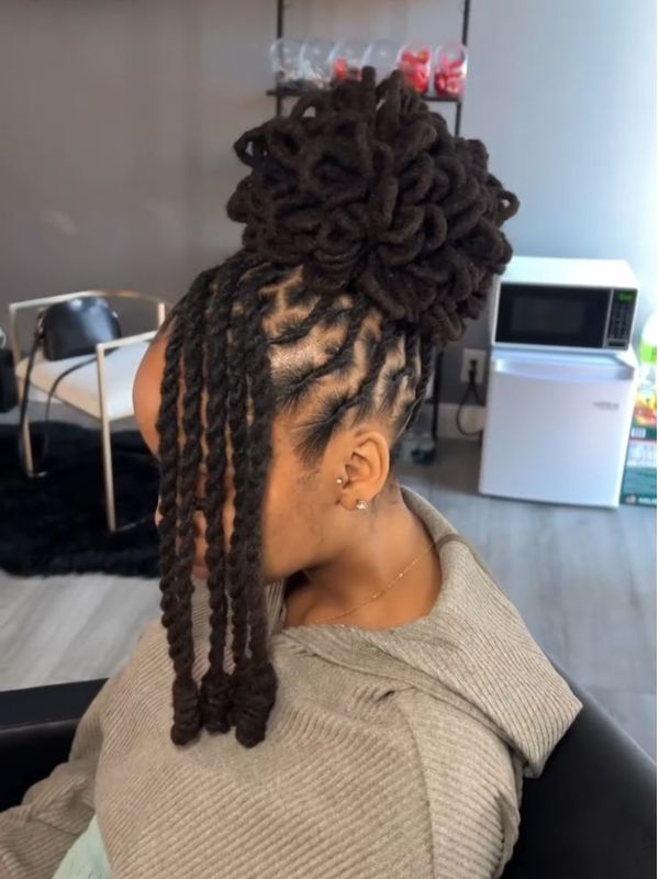 Long-Barrel-Twist-Locs-With-Floral-Accessories-for-Women